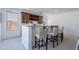 Entertain in style with this bar featuring a granite countertop and custom wine storage at 3574 E Glacier Pl, Chandler, AZ 85249