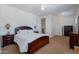 Bedroom with ceiling fan, lamps, carpet and nice furniture at 3574 E Glacier Pl, Chandler, AZ 85249