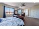 Bright, airy bedroom with large windows providing natural light and charming neighborhood views at 3574 E Glacier Pl, Chandler, AZ 85249