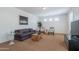 Upstairs bonus room with neutral paint, carpet, and a relaxed seating area at 3574 E Glacier Pl, Chandler, AZ 85249