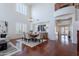 Bright dining room featuring high ceilings, wood floors, and neutral decor at 3574 E Glacier Pl, Chandler, AZ 85249