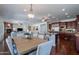 Dining area with hardwood floors connects to the kitchen and living area at 3574 E Glacier Pl, Chandler, AZ 85249