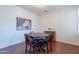 Game room with a dark wood poker table and hardwood flooring at 3574 E Glacier Pl, Chandler, AZ 85249