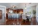 Spacious kitchen with a breakfast bar, stainless appliances, and rich wood cabinetry at 3574 E Glacier Pl, Chandler, AZ 85249