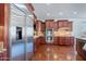 Modern kitchen featuring stainless steel refrigerator and ample cabinet space at 3574 E Glacier Pl, Chandler, AZ 85249