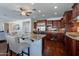 Spacious kitchen featuring stainless steel appliances, granite island, and bar seating at 3574 E Glacier Pl, Chandler, AZ 85249