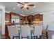Stylish kitchen island with granite countertops and seating for casual dining at 3574 E Glacier Pl, Chandler, AZ 85249