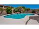 Backyard pool with lush landscaping offering a serene and private retreat at 3574 E Glacier Pl, Chandler, AZ 85249