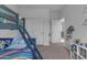 bedroom featuring bunk beds and a closet at 4093 E Dublin St, Gilbert, AZ 85295