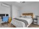 Comfortable bedroom featuring a modern desk, ceiling fan and plush bed, perfect for relaxation and work at 4093 E Dublin St, Gilbert, AZ 85295
