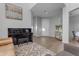 Bright and airy living room featuring wood floors, modern furnishings, and neutral decor at 4093 E Dublin St, Gilbert, AZ 85295