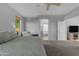 Spacious main bedroom with natural light, complemented by an archway leading to the bathroom at 4093 E Dublin St, Gilbert, AZ 85295
