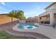 Private pool with a seating area and covered patio, ideal for backyard gatherings at 4093 E Dublin St, Gilbert, AZ 85295