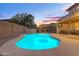Beautiful pool area with umbrella and covered patio, perfect for relaxing evenings at 4093 E Dublin St, Gilbert, AZ 85295