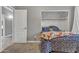 Cozy bedroom featuring carpet flooring, closet, and a comfortable bed at 43271 W Little Dr, Maricopa, AZ 85138