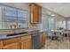 Kitchen featuring granite countertops, stainless steel appliances, and a casual dining area at 43271 W Little Dr, Maricopa, AZ 85138