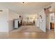 Bright living room with carpet and neutral paint, featuring a large window at 4333 E Desert Cactus St, Phoenix, AZ 85032