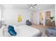 Light-filled main bedroom showcasing ensuite bathroom and walk-in closet access, plus stylish decor at 476 S Soho Ln # 2, Chandler, AZ 85225
