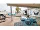 Inviting backyard features a patio, gravel, seating, and string lights, perfect for outdoor relaxation and entertaining at 5309 W Dahlia Dr, Glendale, AZ 85304