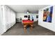 Entertaining game room with a pool table, bar stools, and modern decor at 5309 W Dahlia Dr, Glendale, AZ 85304