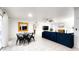 Open-concept living room with a dining set and a comfortable seating area at 5309 W Dahlia Dr, Glendale, AZ 85304