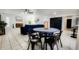 Living Room with a modern dining set and fireplace creates a cozy atmosphere at 5309 W Dahlia Dr, Glendale, AZ 85304
