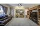 Cozy living room with wood built ins, shelving, and comfortable seating at 6030 W Topeka Dr, Glendale, AZ 85308