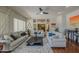 Inviting living room featuring neutral décor, ceiling fan, and an open layout at 6030 W Topeka Dr, Glendale, AZ 85308