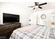 Relaxing bedroom with hardwood floors, natural light, and modern dresser at 6522 E 2Nd St, Scottsdale, AZ 85251