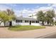 Lovely single-story home with a well-maintained lawn and updated exterior features, offering inviting curb appeal at 6522 E 2Nd St, Scottsdale, AZ 85251
