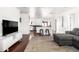 Open-concept living room with hardwood floors and modern decor, perfect for comfortable living at 6522 E 2Nd St, Scottsdale, AZ 85251