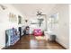 Bright playroom with ample natural light, hardwood floors, and neutral decor at 6522 E 2Nd St, Scottsdale, AZ 85251