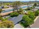 Stunning aerial perspective featuring a home near a canal, surrounded by mature trees and well-kept lawns at 6837 E Lafayette Blvd, Scottsdale, AZ 85251