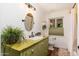 Unique bathroom featuring a decorative sink and a window for natural light at 6837 E Lafayette Blvd, Scottsdale, AZ 85251
