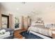 Charming bedroom with backyard access and hardwood floors at 6837 E Lafayette Blvd, Scottsdale, AZ 85251
