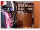 Walk-in closet with custom shelving and storage at 6837 E Lafayette Blvd, Scottsdale, AZ 85251