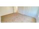 Neutral bedroom with closet and a view to the hallway through the open doorway at 7425 W Crown King Rd, Phoenix, AZ 85043