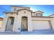 Charming two-story home with a neutral color scheme and a two car garage at 7425 W Crown King Rd, Phoenix, AZ 85043
