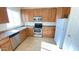 Functional kitchen featuring stainless steel appliances and ample counter space at 7425 W Crown King Rd, Phoenix, AZ 85043
