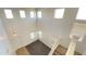 A high angle view of a living room with soaring ceilings and natural light at 7425 W Crown King Rd, Phoenix, AZ 85043