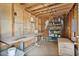 Barn space featuring a work table, storage shelf, and equipment for maintaining livestock at 870 S La Paz Rd, Maricopa, AZ 85139