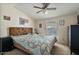 Bedroom with bright window, ceiling fan and closet at 870 S La Paz Rd, Maricopa, AZ 85139
