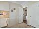 Bedroom leading to laundry room with carpet flooring at 870 S La Paz Rd, Maricopa, AZ 85139