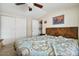 Bedroom with view to laundry room, white walls and carpet flooring at 870 S La Paz Rd, Maricopa, AZ 85139