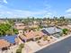 An aerial view looking out at the neighborhood with palm trees and a blue sky at 928 W Natal Ave, Mesa, AZ 85210