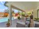 Backyard with covered patio and outdoor seating at 928 W Natal Ave, Mesa, AZ 85210