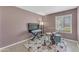 Cozy living room space with a music keyboard and a drum set on a fluffy white rug at 928 W Natal Ave, Mesa, AZ 85210