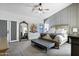 Serene main bedroom featuring a cozy bed, stylish decor, and designer touches at 10102 E Dreyfus Ave, Scottsdale, AZ 85260