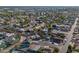 Panoramic aerial view of a community with many homes, pools, and green spaces at 1057 S 74Th St, Mesa, AZ 85208