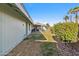 Well-kept backyard features lush greenery, a grill, and ample space for outdoor activities and entertainment at 1057 S 74Th St, Mesa, AZ 85208